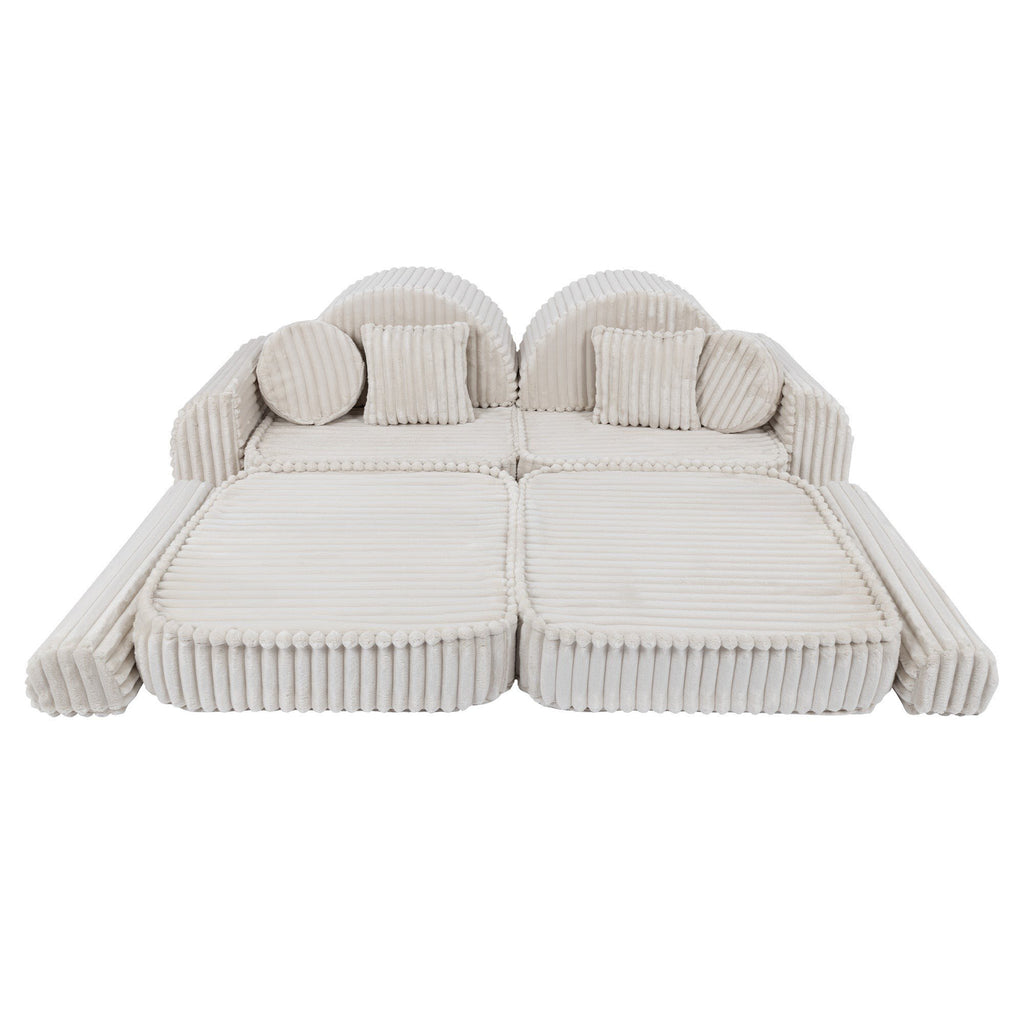 8. Medium kids sofa in churros white with ribbed corduroy fabric, featuring two seats and round cushions, arranged in a flat configuration.