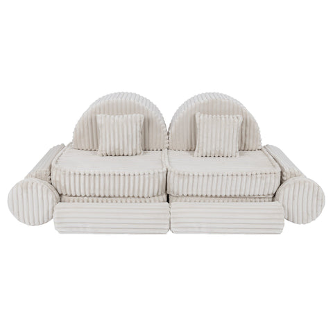 4. Medium kids sofa in churros white with ribbed corduroy fabric, featuring two seats and square cushions, arranged in a symmetrical layout.