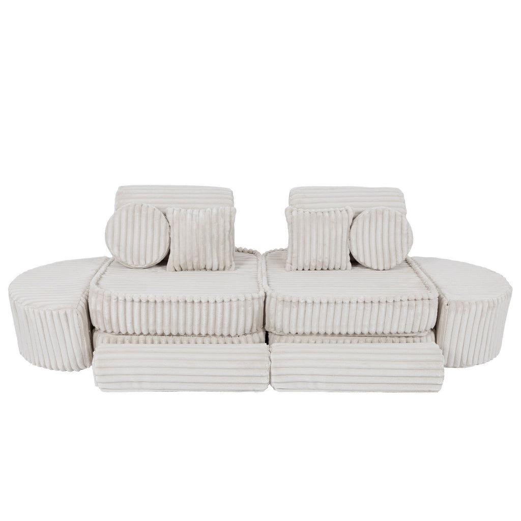 6. Medium kids sofa in churros white with ribbed corduroy fabric, featuring two seats and round cushions, arranged in a compact configuration.