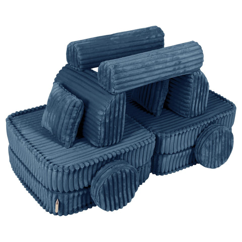 2. Medium modular kids sofa in churros blue configured as a playful vehicle with ribbed corduroy texture and circular cushion wheels