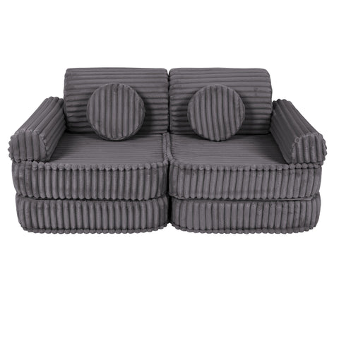 2. Medium kids sofa in Jurassic grey with ribbed corduroy fabric, featuring round cushions, shown in a compact setup.