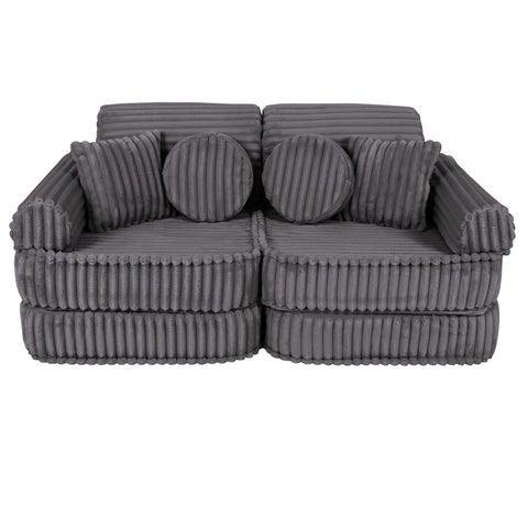 1. Medium modular kids sofa in Jurassic grey with ribbed corduroy texture, featuring round and rectangular cushions, shown in a compact configuration.