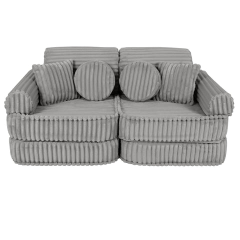 1. Medium modular kids sofa in moon grey with ribbed corduroy texture, featuring round and square cushions, shown in a compact configuration