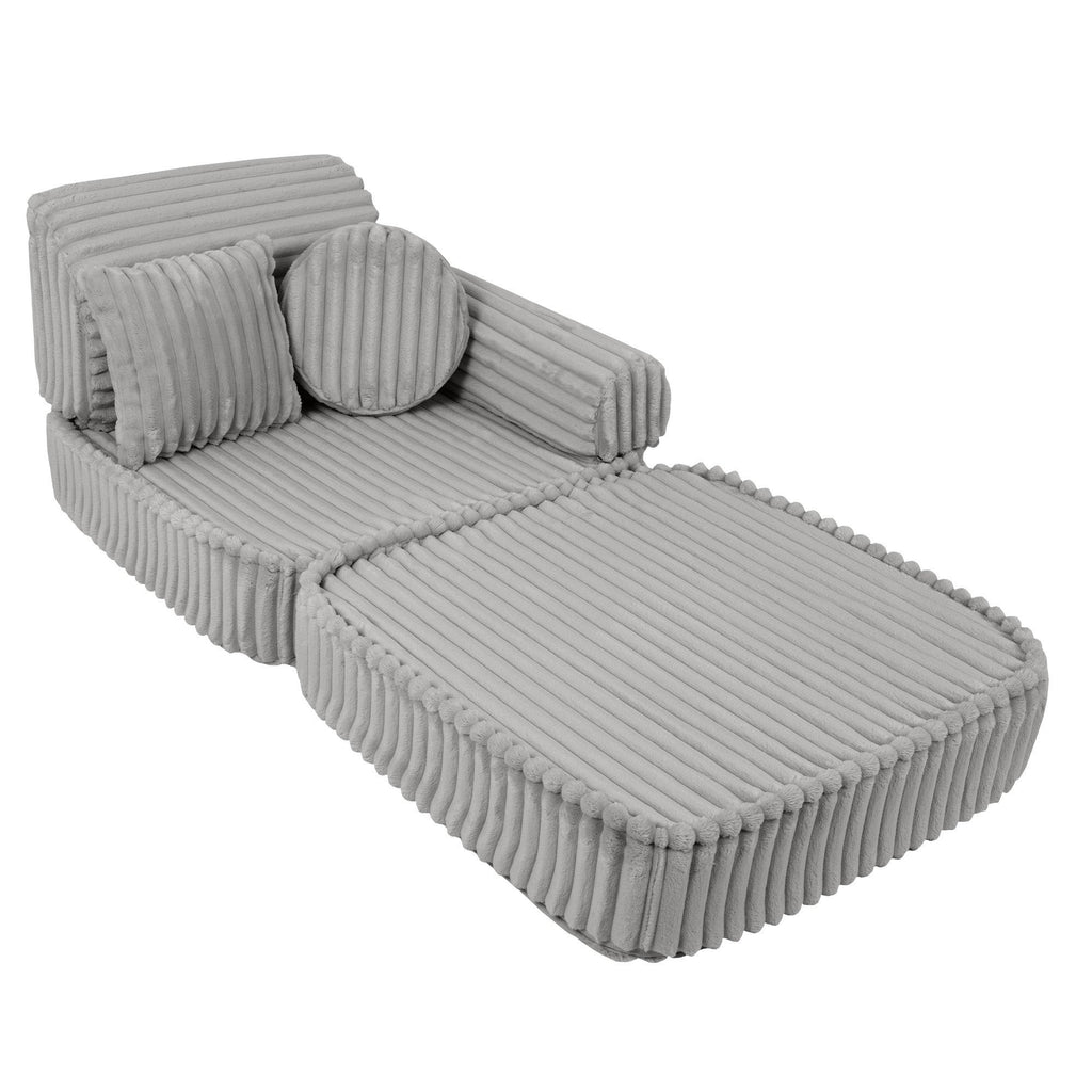 6. Medium kids sofa in moon grey with ribbed corduroy fabric, shown in a chaise lounge configuration with round and square cushions