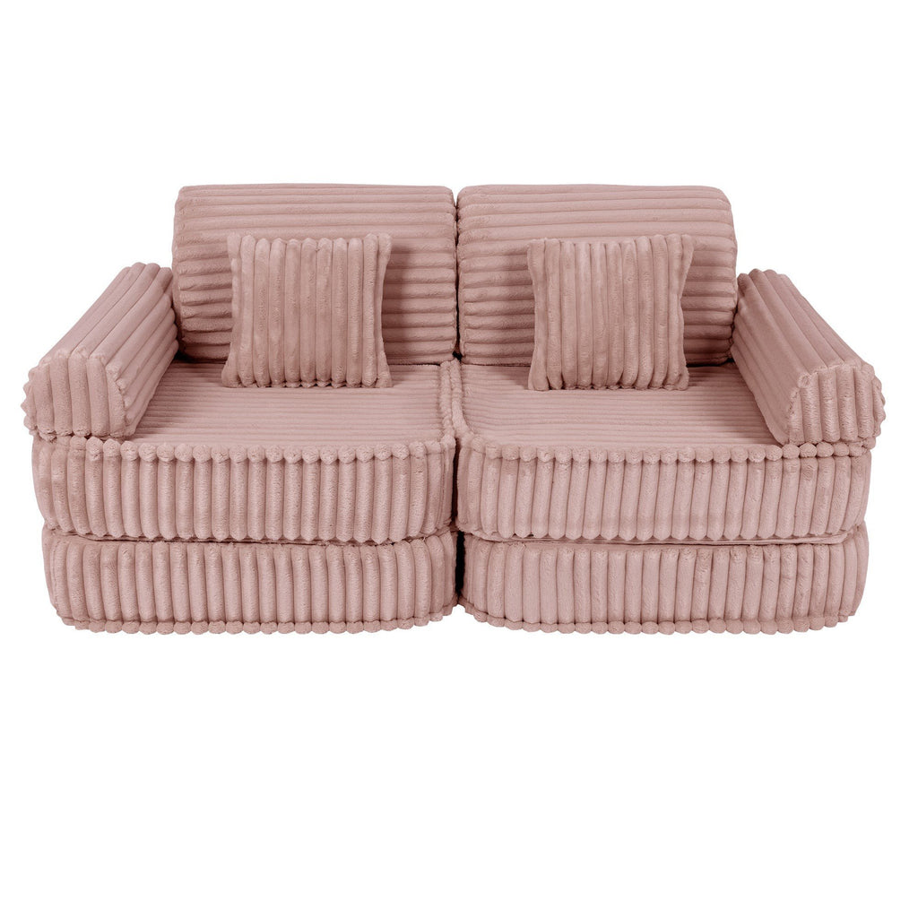 3. Medium modular kids sofa in churros pink with ribbed corduroy texture, featuring two square cushions, shown in a compact configuration