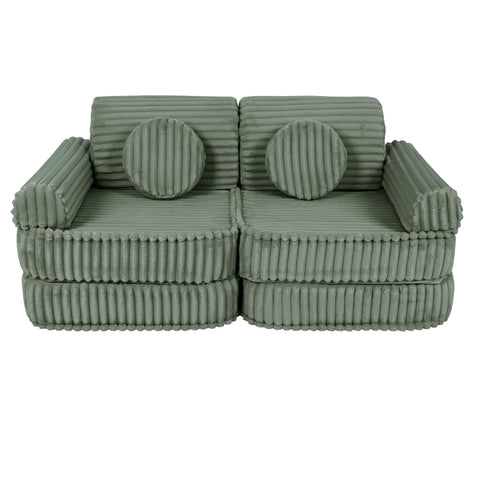 3. Medium kids sofa in sage green with ribbed corduroy texture, featuring round cushions, shown in a compact setup