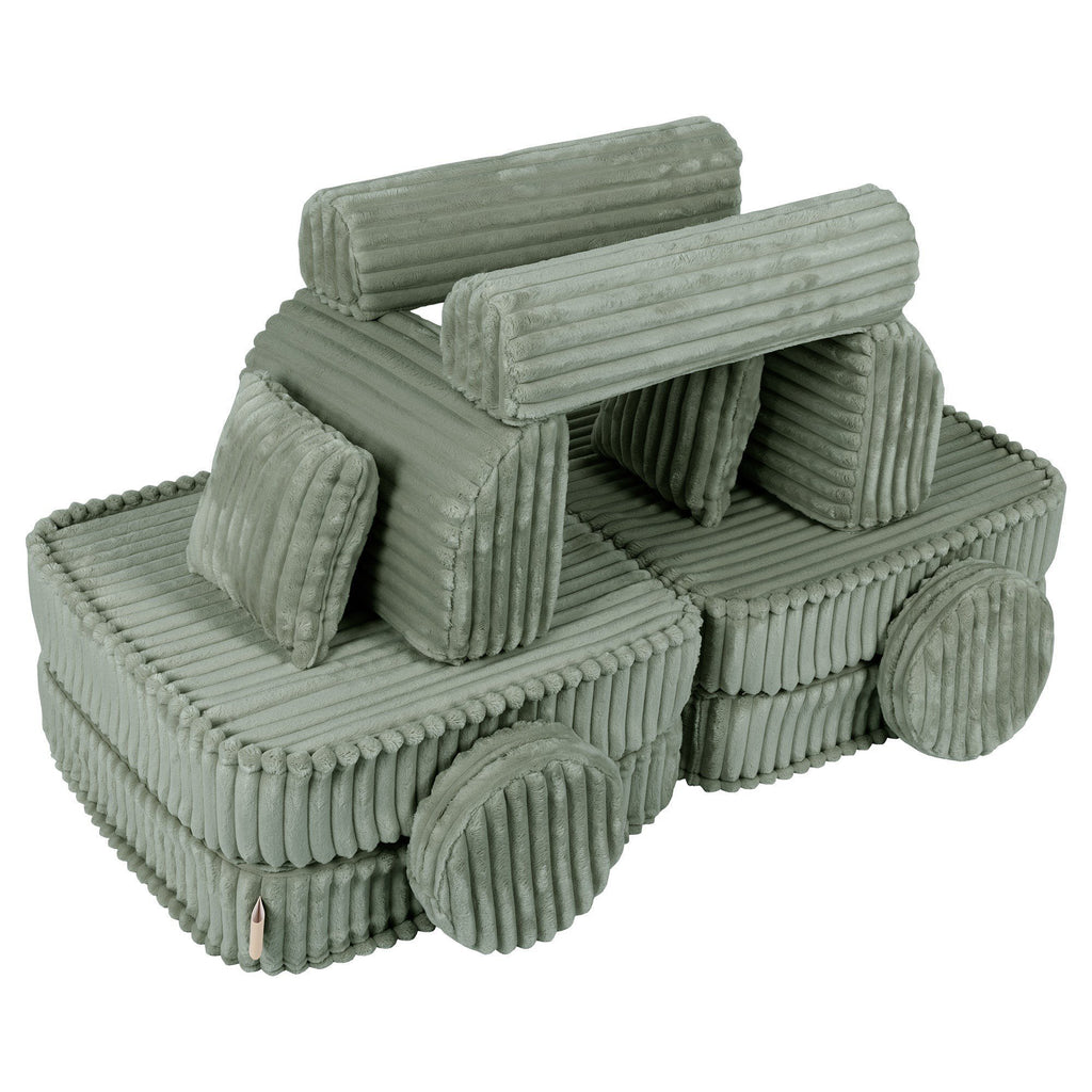 6. Medium kids sofa in sage green ribbed corduroy, creatively arranged in a playful vehicle shape