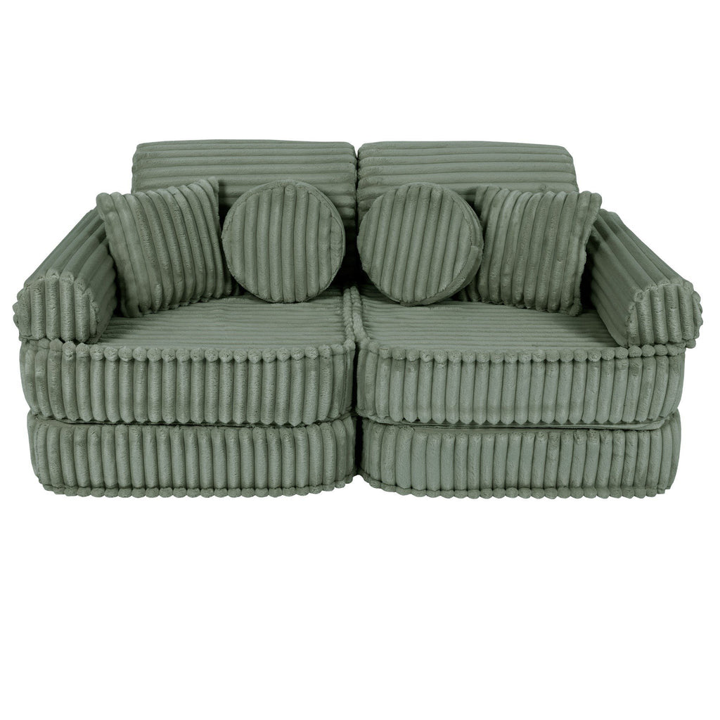 1. Medium modular kids sofa in sage green with ribbed corduroy texture, featuring round and rectangular cushions, shown in a compact configuration