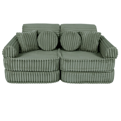 1. Medium modular kids sofa in sage green with ribbed corduroy texture, featuring round and rectangular cushions, shown in a compact configuration