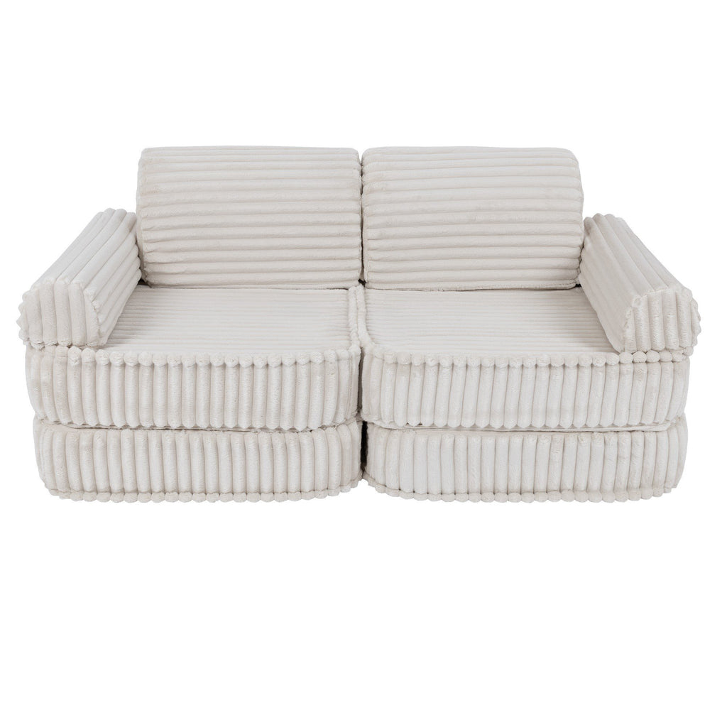 6. Medium kids sofa in churros white with ribbed corduroy fabric, shown in a compact configuration without cushions.