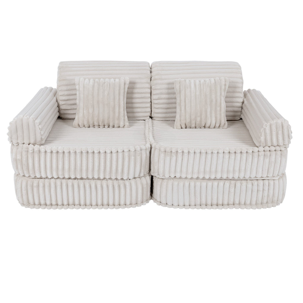 7. Medium kids sofa in churros white with ribbed corduroy fabric, featuring two rectangular cushions, shown in a compact configuration.
