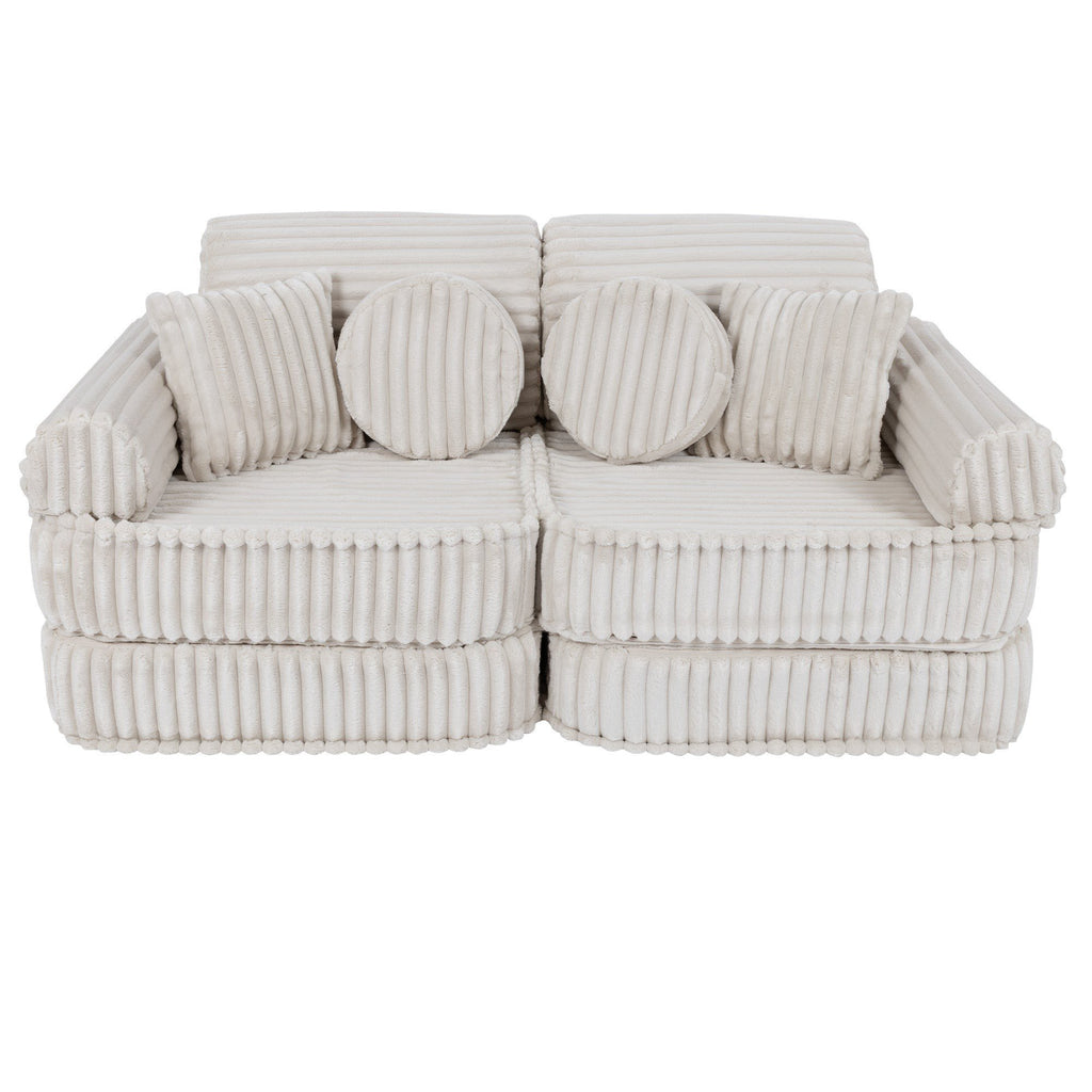 1. Medium modular kids sofa in churros white with ribbed corduroy fabric, featuring two round and two rectangular cushions, shown in a compact configuration.