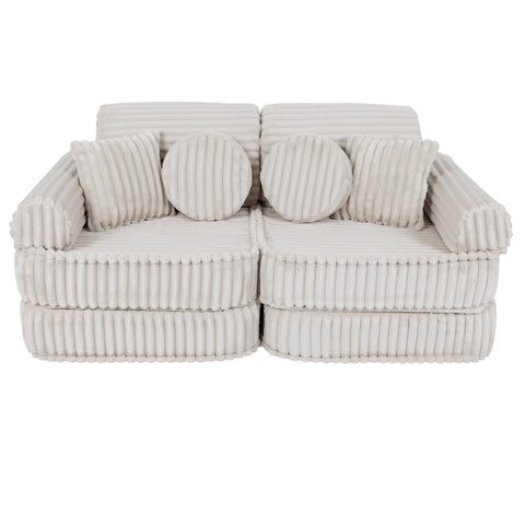1. Medium modular kids sofa in churros white with ribbed corduroy fabric, featuring two round and two rectangular cushions, shown in a compact configuration.