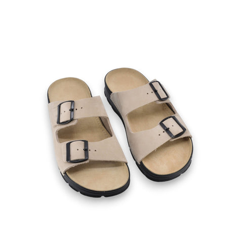 5. Pair of Omaking Meeliku beige leather sandals with adjustable buckle straps in studio