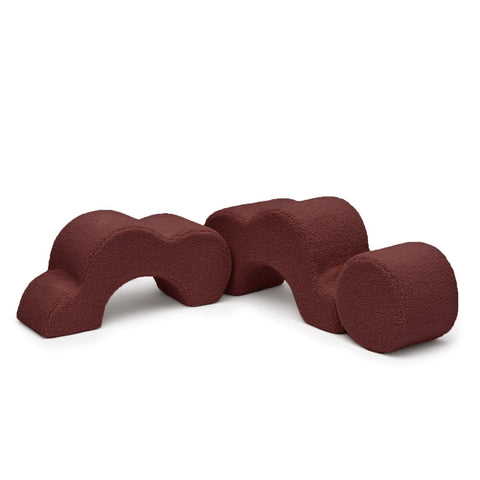 4. Flat lay of MeowBaby foam flower shape set in dark brown, showing two curved modules and a cylindrical piece