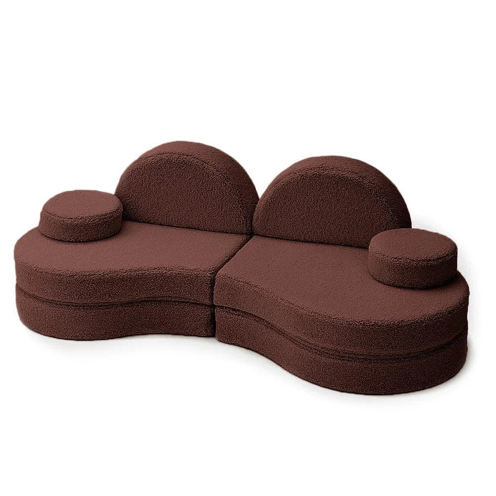 1. Modular kids' sofa in Bearly Brown with rounded shapes and two circular cushions, shown in a compact configuration on a white background