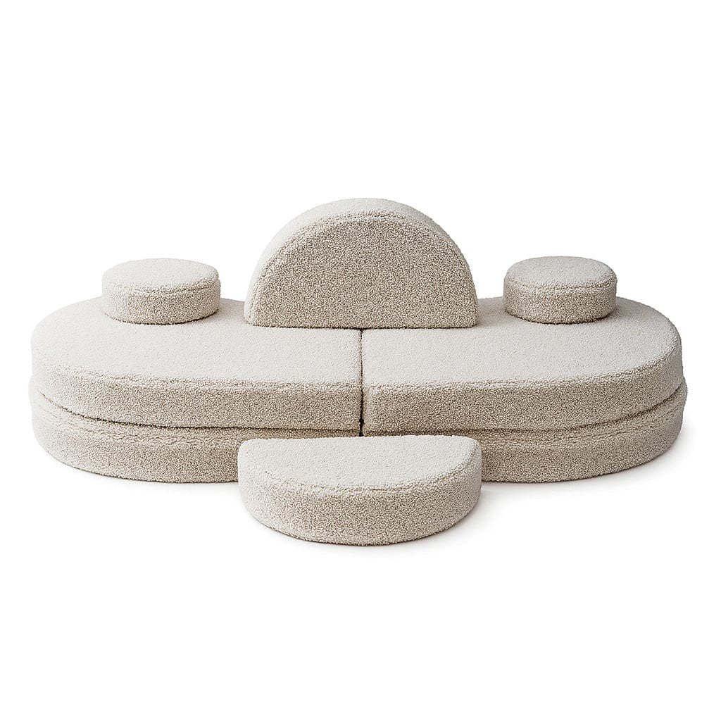 4. Modular kids' sofa in Bearly light gray with central backrest and three round cushions, shown in a symmetrical layout