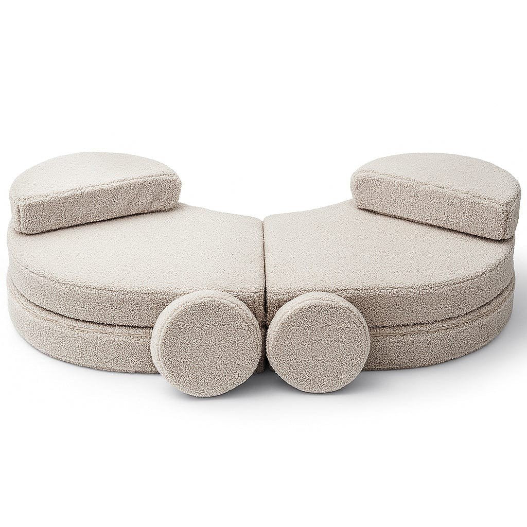 5. Modular kids' sofa in Bearly light gray with two round cushions at the front, displayed in a semi-circular arrangement