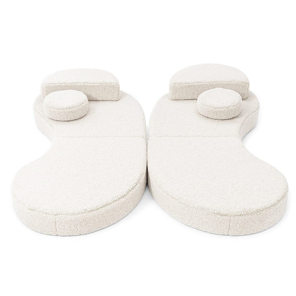2. Modular kids' sofa in Bearly off-white, shown in a split configuration with circular cushions and backrests on a white background
