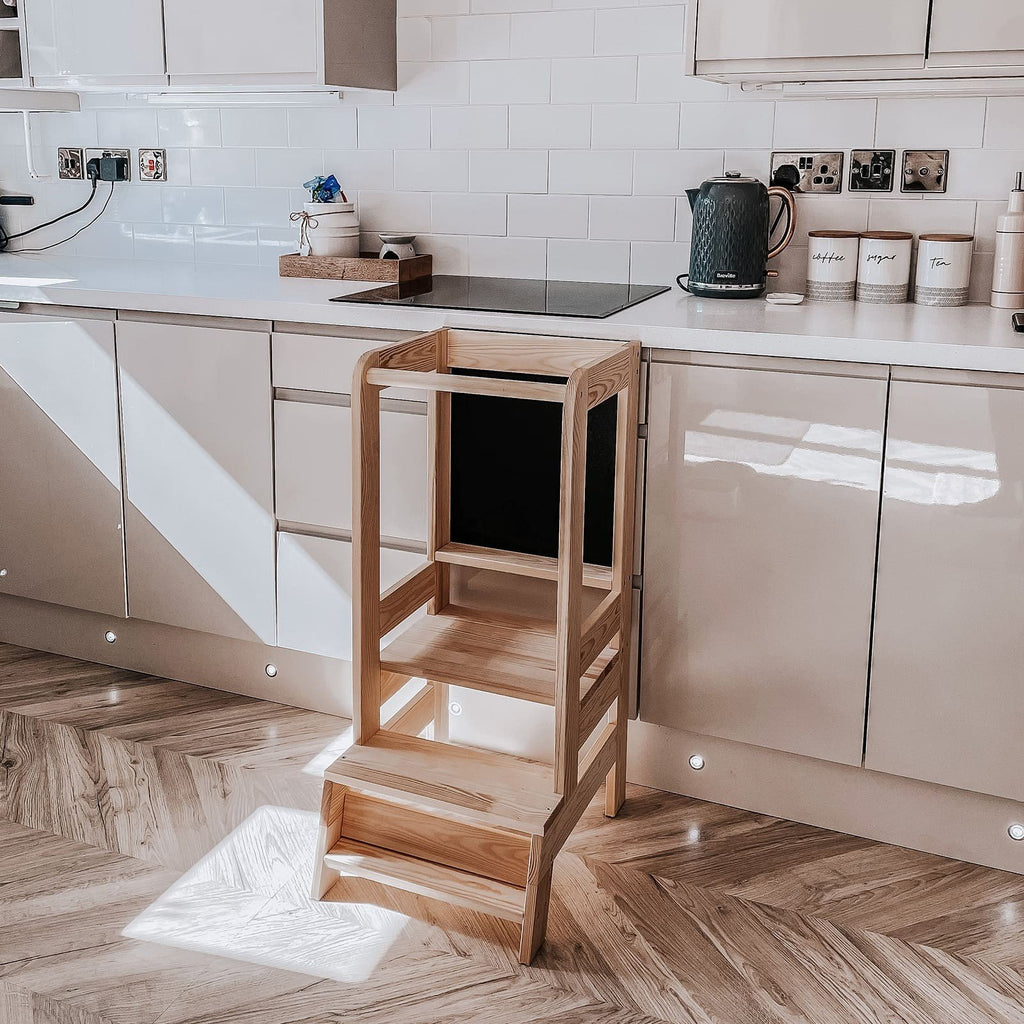 1. Wooden kitchen helper in natural finish placed in modern kitchen setting