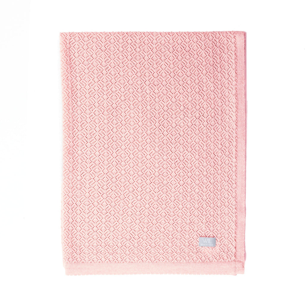 2. Pink merino wool baby blanket with Wool In Love label on white background