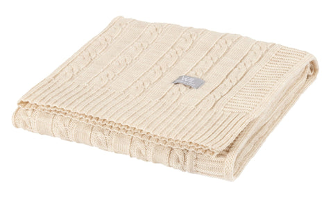 2. Folded cream merino wool baby blanket with cable knit design and Wool In Love logo on white background