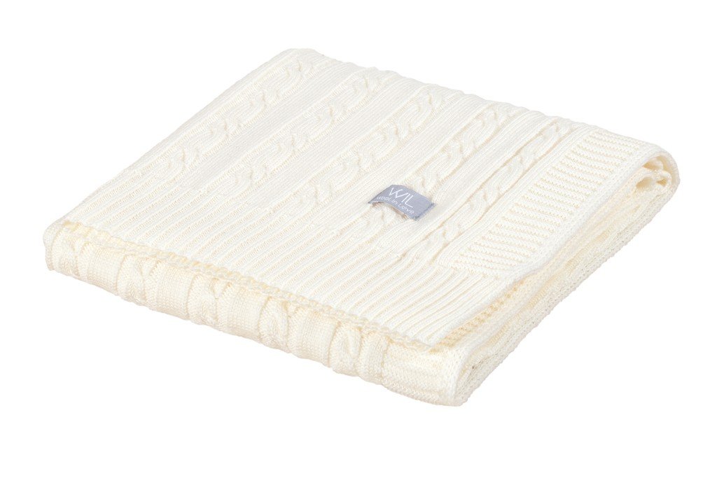 6. Folded white merino wool baby blanket with cable knit pattern and Wool In Love logo on white background