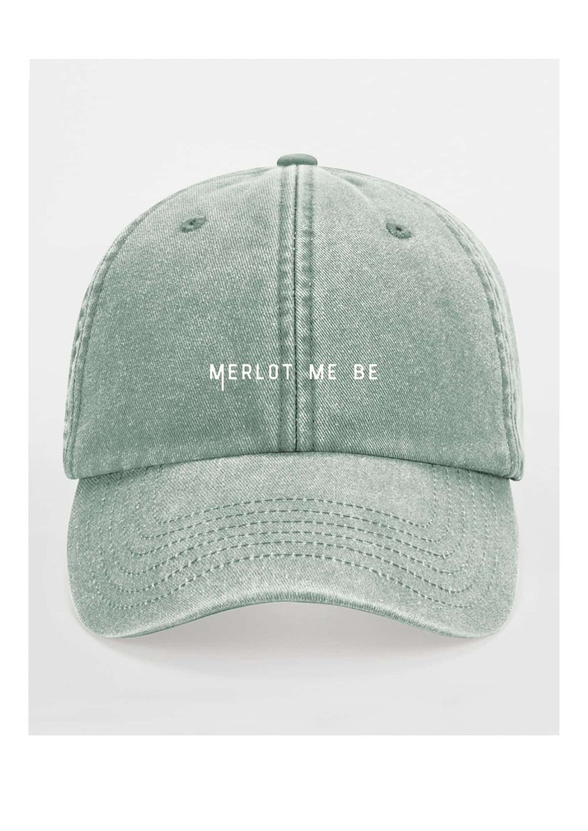 2. Green Merlot Me Be cap by Black Giraffe Brand with white text on front, studio background
