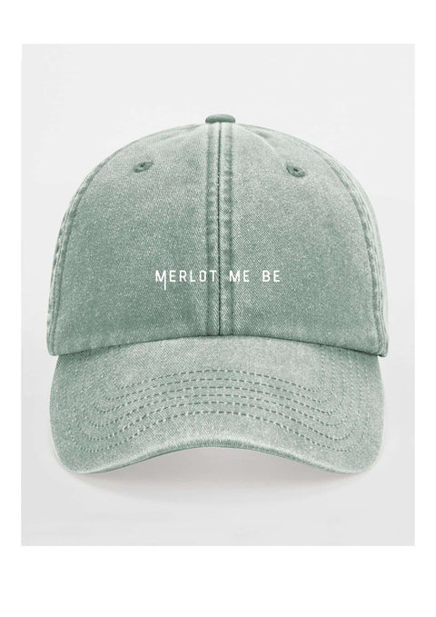 2. Green Merlot Me Be cap by Black Giraffe Brand with white text on front, studio background