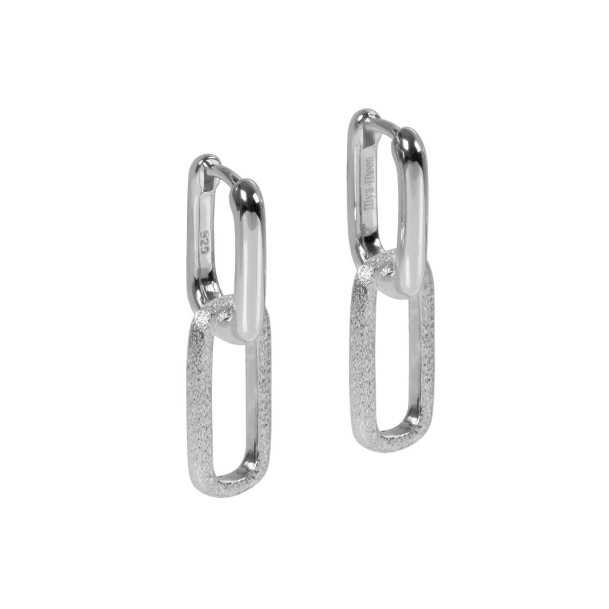 2. MyaMoon Metropolitan Earrings in rhodium plating, featuring a sleek 27 mm length and minimalist design