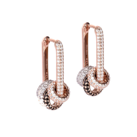 2. Pair of Metropolitan Glow earrings with rose gold plating and white zircon charms on a white background