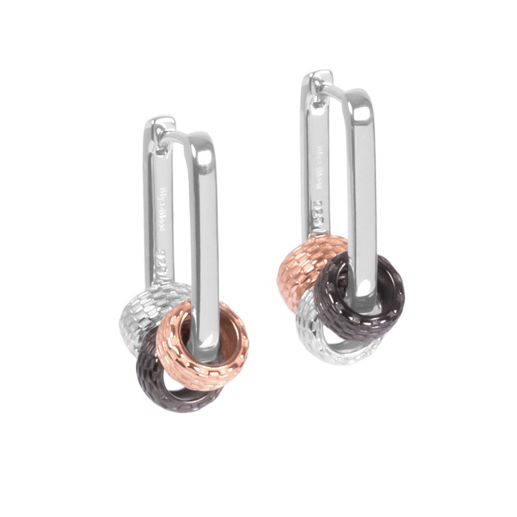 2. MyaMoon Metropolitan Hoops Rolling Charm in silver and rose gold, highlighting minimalistic design and charm details, studio shot
