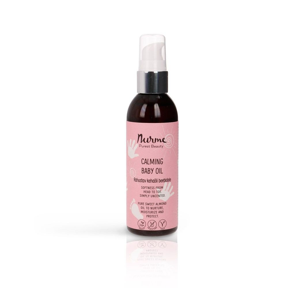 1. Nurme Calming Baby Oil 100ml bottle with pink label featuring organic almond oil for nourishing and protecting baby's skin, shown on a white background