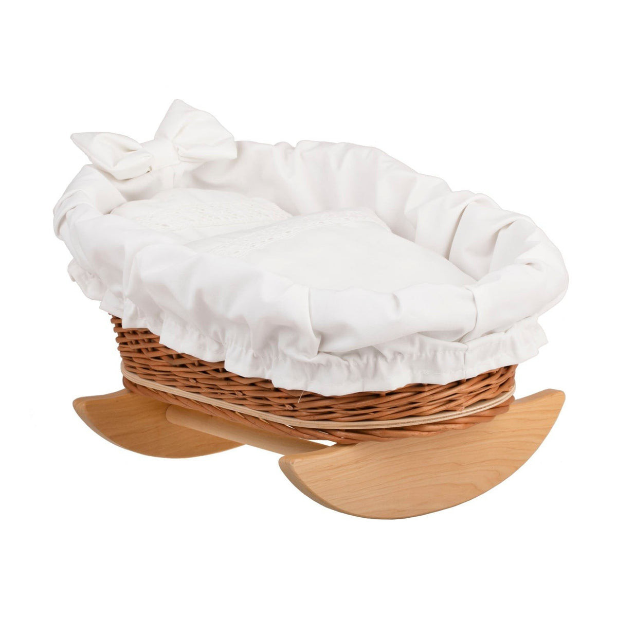 1. Wicker Stories doll cradle with white lining, pillow, and duvet on wooden runners, showcasing traditional craftsmanship and natural materials