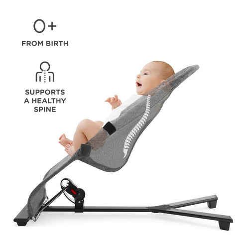 1. Baby in grey Kinderkraft MIMI bouncer with healthy spine support, shown in side view with text overlay