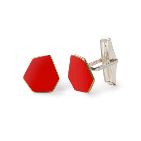 1. Lisa Kroeber Jewellery Mini Cufflinks in vibrant red, hexagonal design, made from powder-coated brass and sterling silver, shown in studio setting