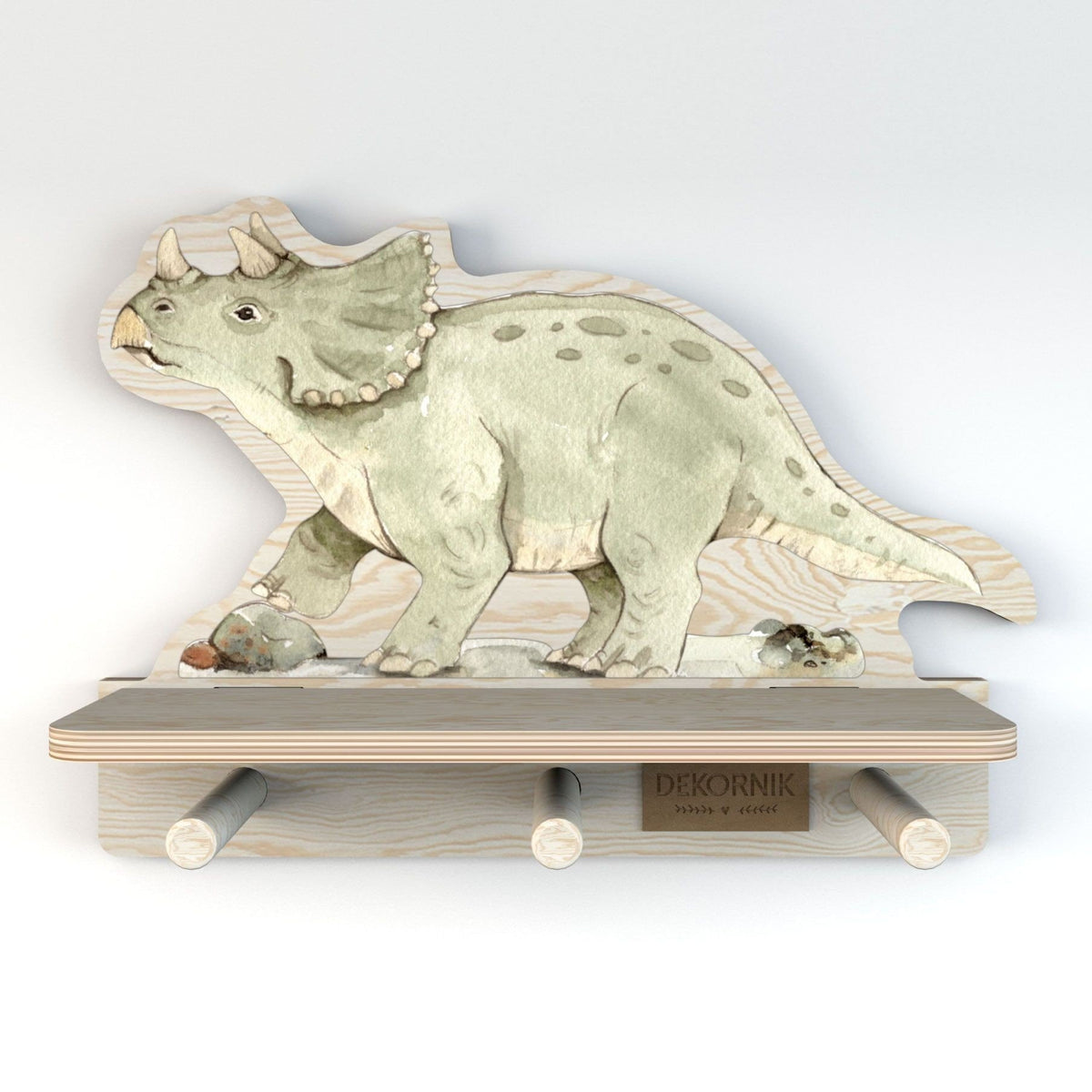 1. Dekornik mini wall shelf with dinosaur design, featuring a green triceratops print on plywood, three pegs underneath, and a small shelf for display, ideal for children's room decor