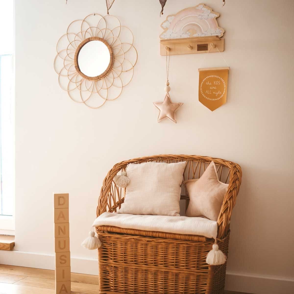 1. Children's room with Dekornik pink rainbow mini wall shelf, wicker chair, and decorative mirror