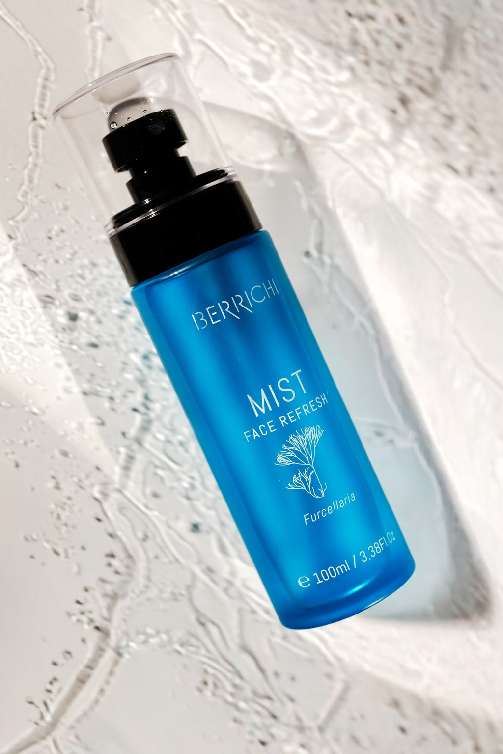 3. Berrichi MIST Face Spray bottle on textured surface, showing product design