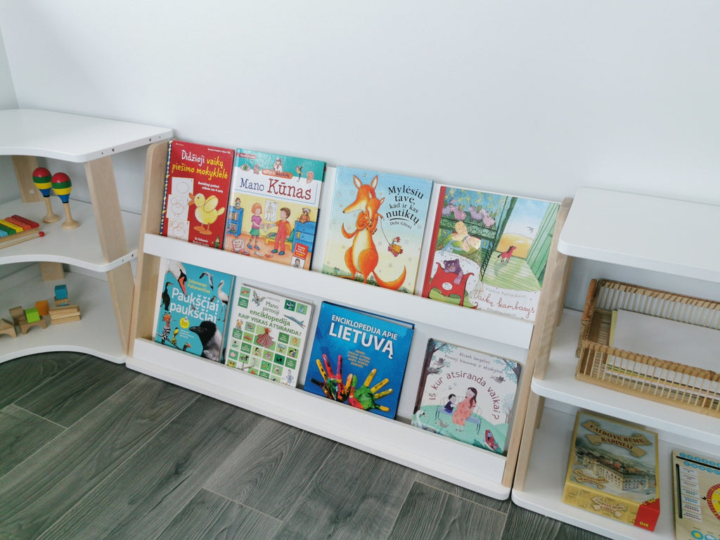 3. Close-up of modular Montessori bookshelf with colorful children's books on two shelves