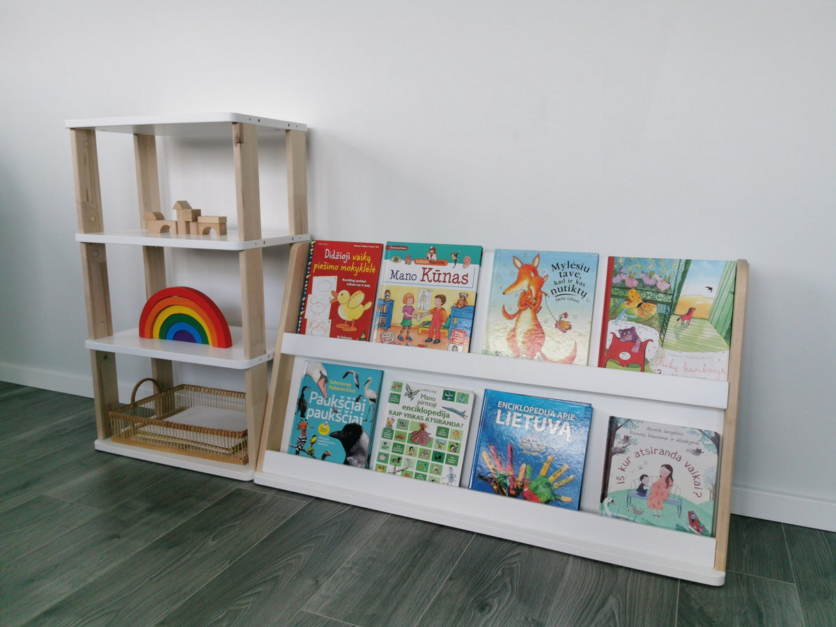 2. Modular Montessori bookshelf with two shelves displaying books and toys in a bright room