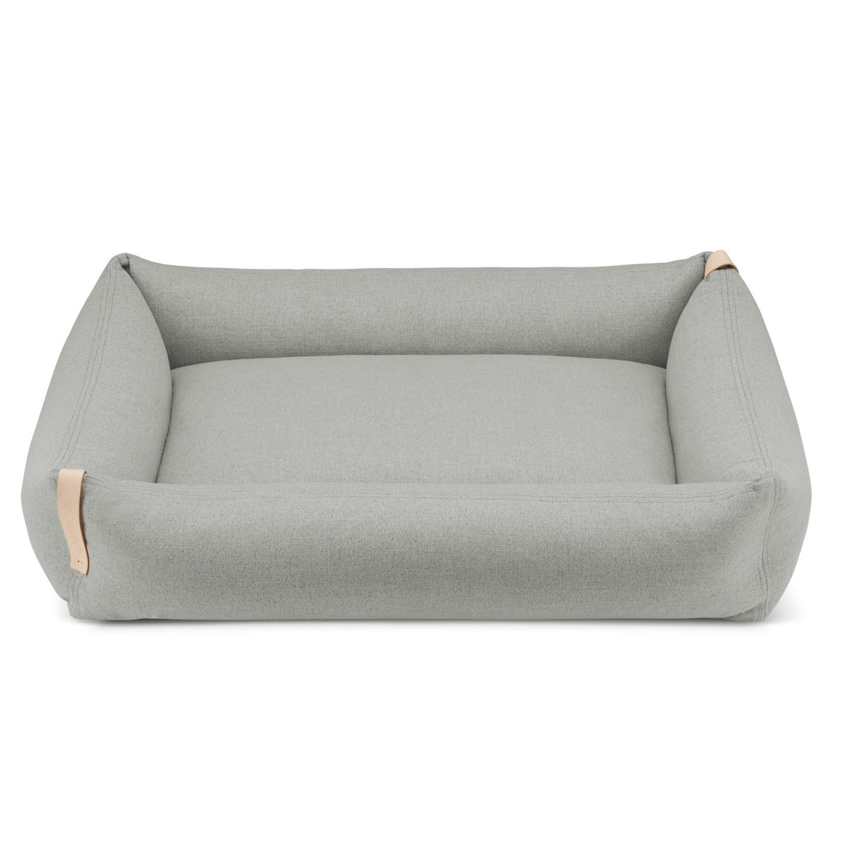 2. Grey Moe dog bed by Labbvenn with a minimalist design, featuring a rectangular shape and natural leather accents, shown on a white background.