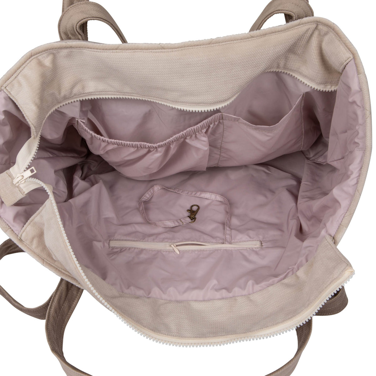 3. Interior view of beige mom weekender bag showing pink waterproof lining and multiple pockets