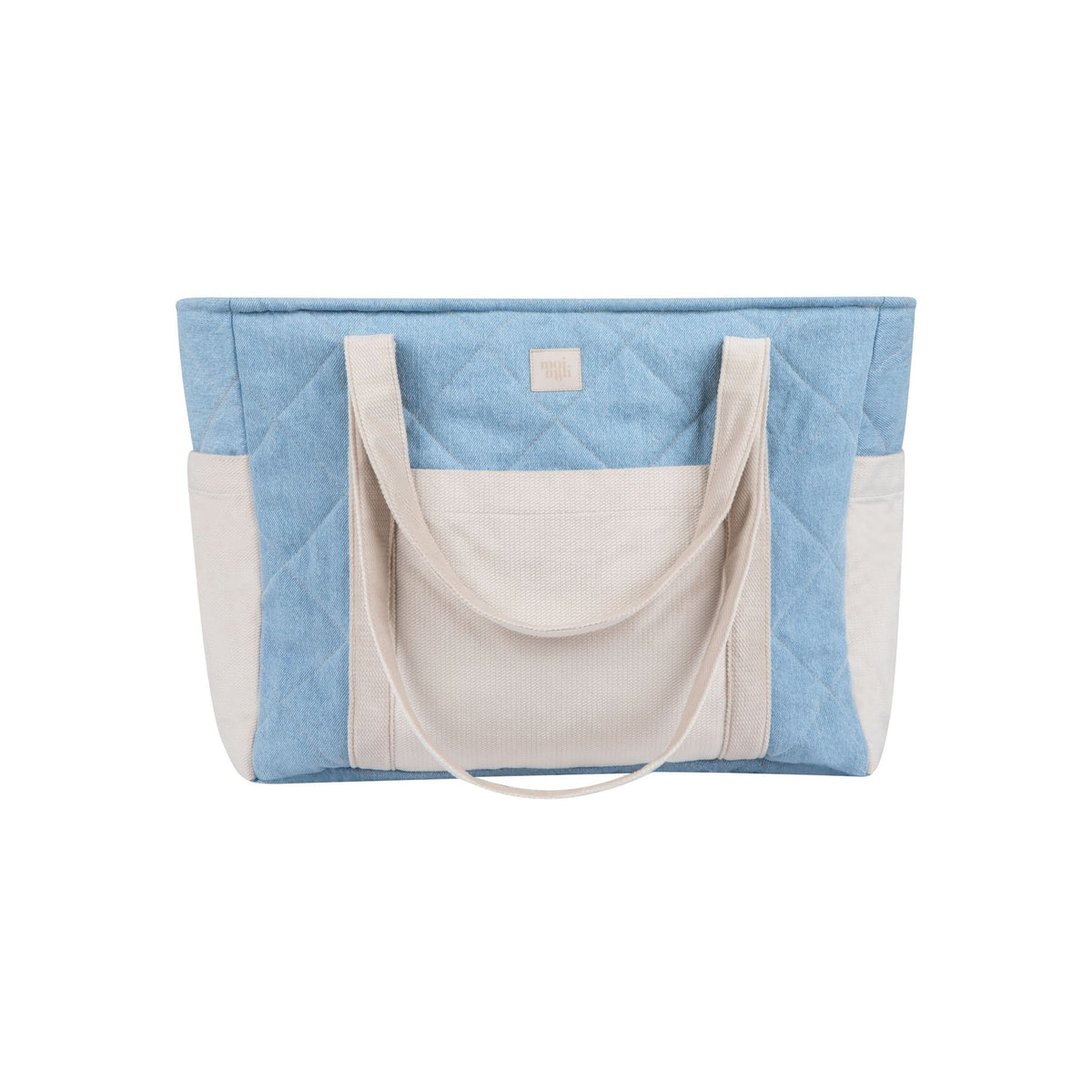 1. Studio shot of blue and beige quilted weekender bag with dual handles and outer pockets by Moi Mili