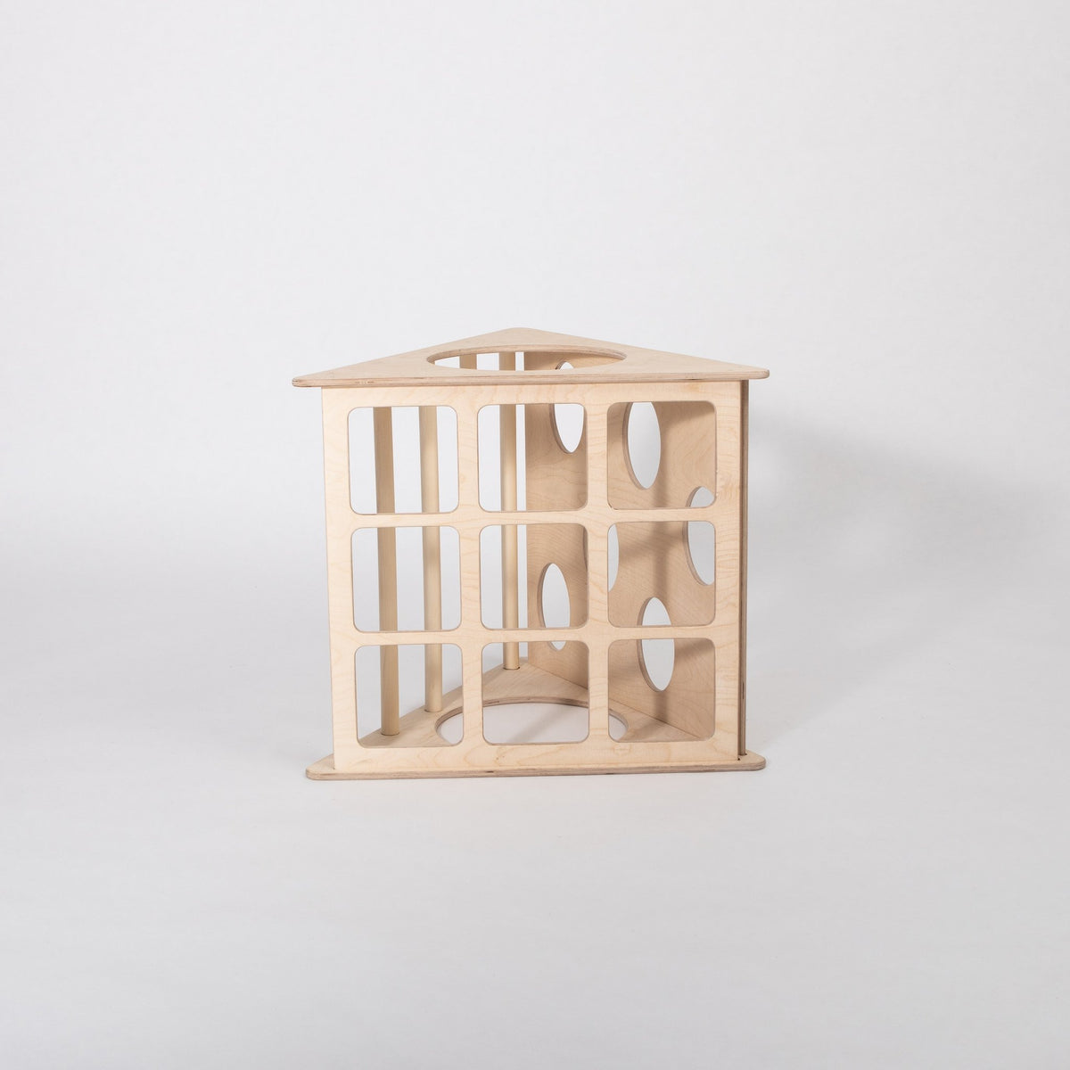 2. Side view of Montessori 3-angle climber made from birch plywood in studio setting