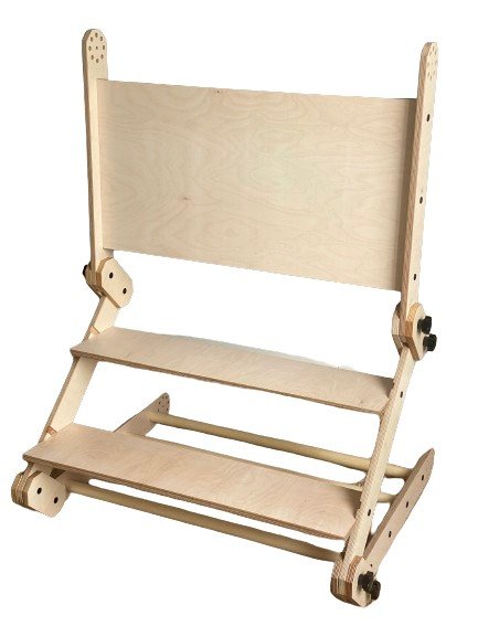 12. Close-up of Montessori climbing set with a plush llama and basket of toys, in a playroom with a chevron curtain.