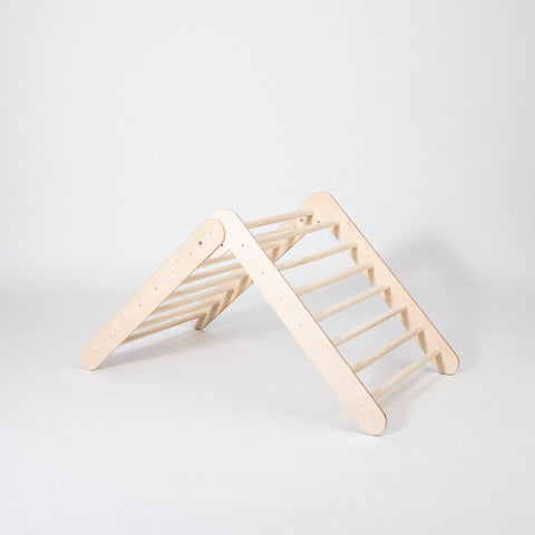 3. Montessori Climbing Triangle in studio setting showing its foldable design and wooden construction