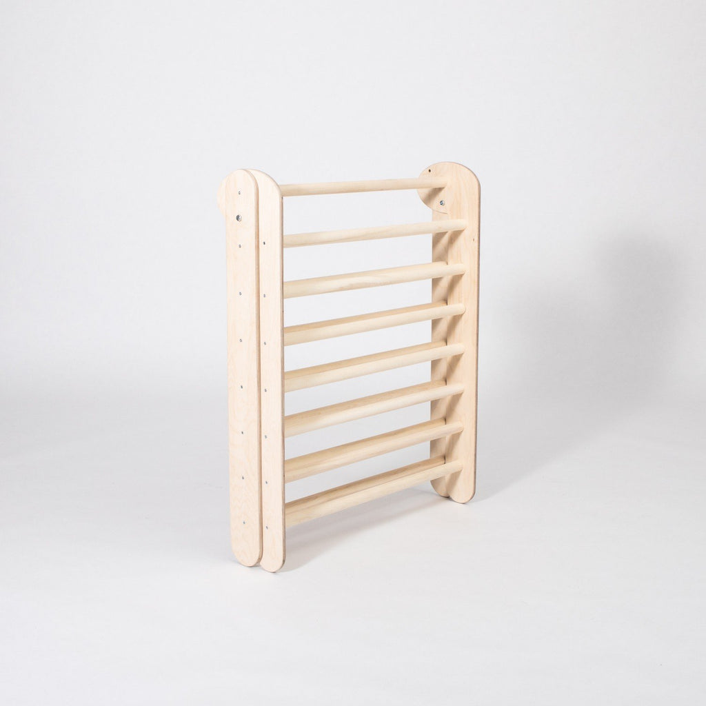 4. Folded Montessori Climbing Triangle in studio setting highlighting its compact storage capability