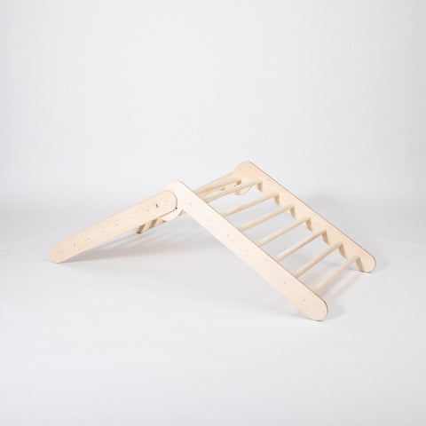 5. Montessori Climbing Triangle in studio setting showing its two slope levels and wooden structure