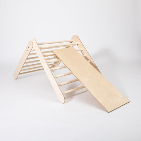 2. Montessori climbing triangle with ramp on white background, showing foldable design and climbing rings